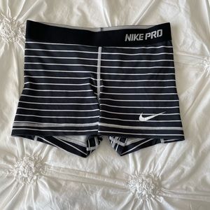 Black and white striped Nike pros